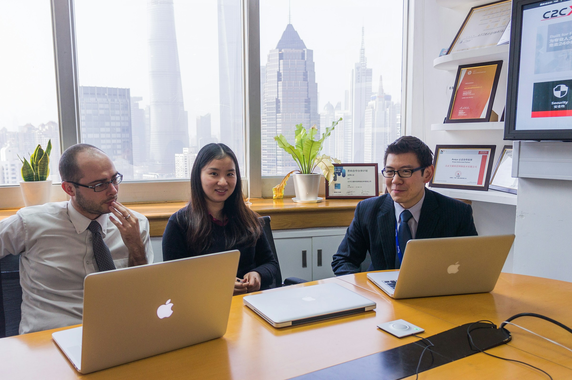 team in an office - TurboTax vs CPA